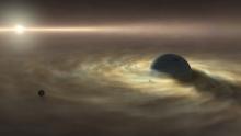 An artist’s impression of a satellite forming around a giant gas planet.