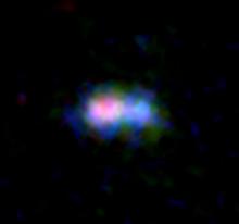 ALMA and Hubble Space Telescope (HST) image of the distant galaxy MACS0416_Y1