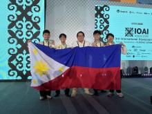 The Philippines debuted with a bang at the 2026 International Olympiad in Artificial Intelligence (IOAI), with (L-R) Jhareign S. Solidum of University of Mindanao Ilang High School (Bronze), Theo Lorenzo T. Bustamante of Philippine Science High School–CALABARZON Region Campus (Silver), Martin Gomez (Team Leader), Juan Mateo J. Desuasido of Brent International School Manila (Bronze), Ellison Matthew S. Ang of Philippine Science High School–Main Campus (Broze) proudly waving the country’s colors. All four stu