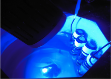 Reaction vials being exposed to blue light from an LED (Photo: Yusuke Masuda).