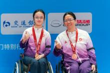 Elite student-athlete Yuen Wing-ki (left) on winning a bronze medal in Women’s Table Tennis Doubles (Class TT5) at the NGD.