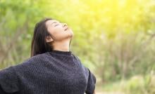 woman breathing freely