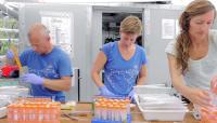 TARA crew working on sample processing 