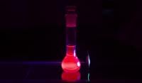 The europium Eu(III) complex with nanocarbon antenna emitting fine red light.