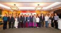 A group photo of guests at the ceremony.