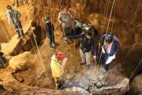 Filipino geoarchaeologist Vito Hernandez (second from right, with camera) 