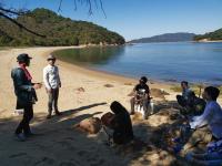 Beach lecture on Naoshima during the 2019 Setouchi Triennale. (Meng Qu / Hiroshima University)